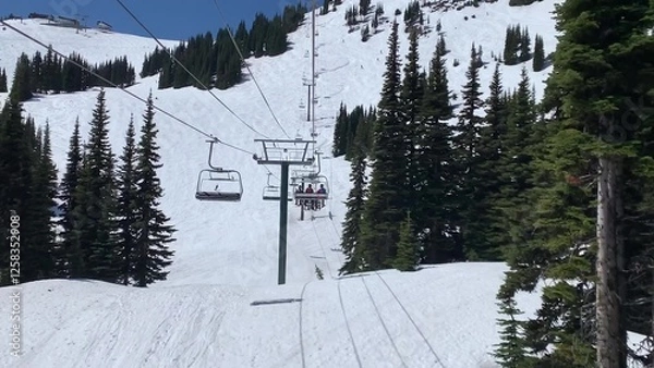 Obraz Invigorating View Of A Ski Lift Ascending A Pristine Snow-covered Mountain