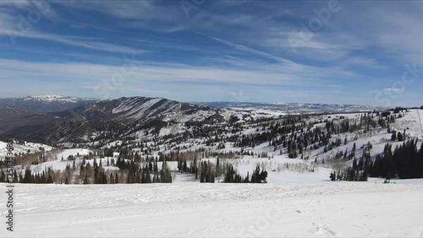 Obraz Scenic View Of Majestic Snow-covered Mountain Range With Verdant Pine Trees
