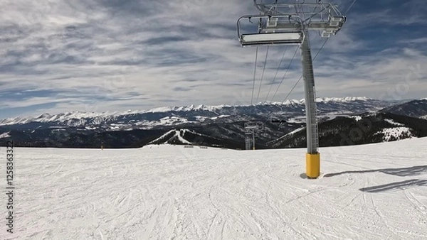 Obraz Active Person Kitted Out In Ski Gear Standing Alone On A Snowy Winter Slope