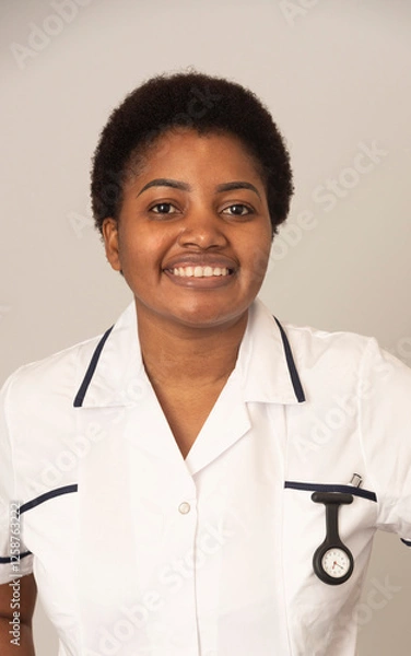 Obraz England United Kingdom, 03.02.2025. Nurse in white coat with a watch and pen in pocket.