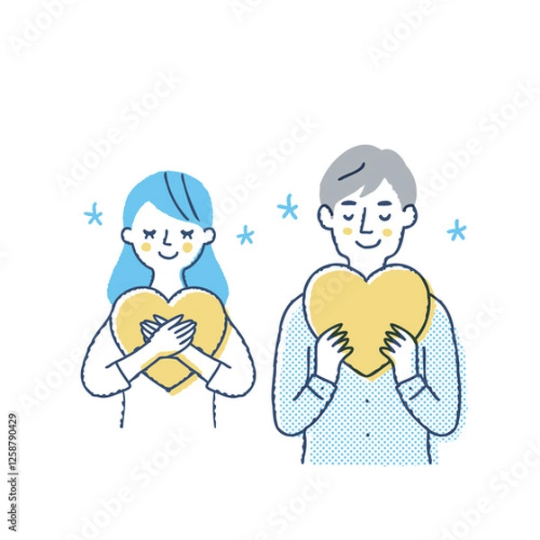 Obraz ハートを持っている笑顔の若いカップル