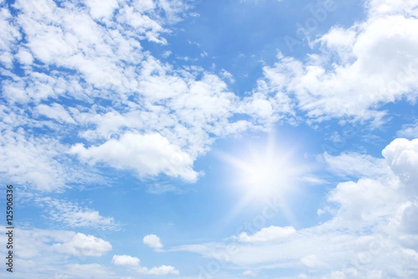Obraz sun and clouds in the blue sky background