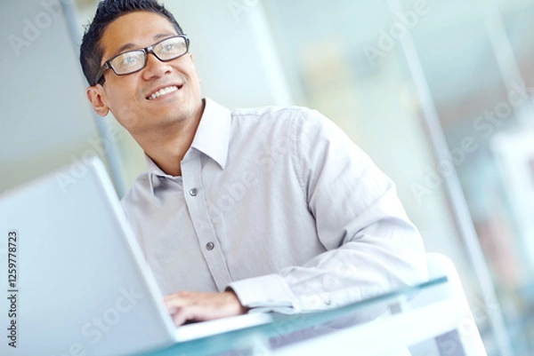 Fototapeta Business, thinking and man with laptop, smile and decision for stock market, investment or email. Person, investor or employee in modern office, computer or research with choice, planning or solution