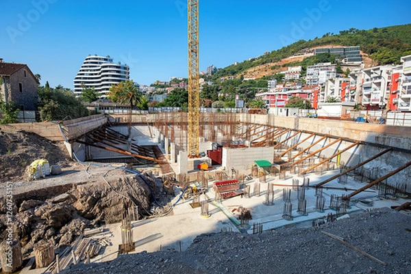 Obraz Construction site showcases modern architecture amid urban development in vibrant neighborhood