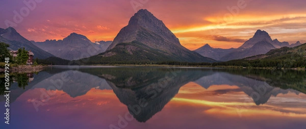 Fototapeta Sunset panorama from the Many Glacier Hotel - reflection on Swiftcurrent Lake of Grinnell Point mountain - Glacier national Park