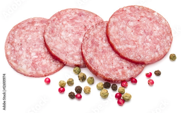Fototapeta Salami smoked sausage slices and peppercorns isolated on white b