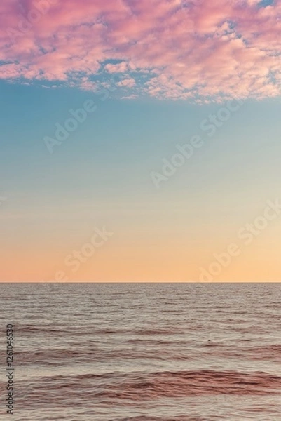 Fototapeta Serene ocean view under pastel skies, reflecting calmness and tr