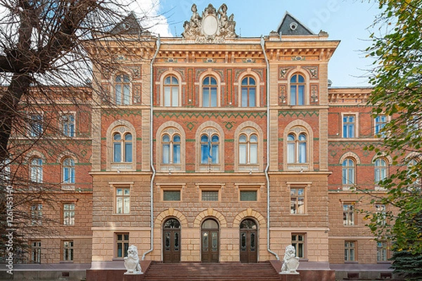 Fototapeta Old building facade of red bricks in Chernivtsi, Ukraine