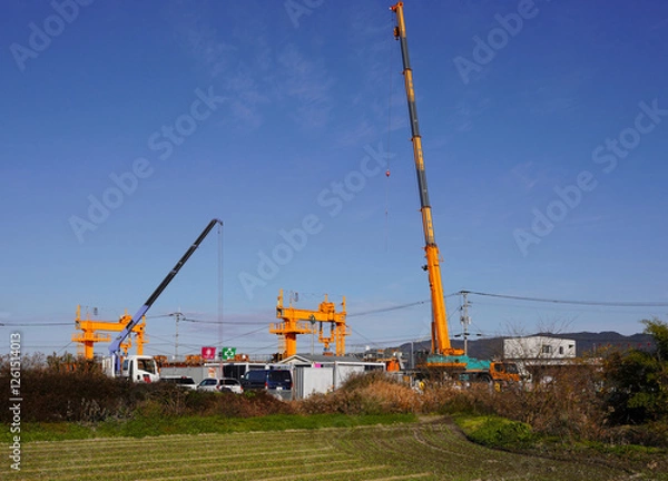 Fototapeta 道路拡張のための橋の架け替え工事　新しい橋の建設工事現場風景