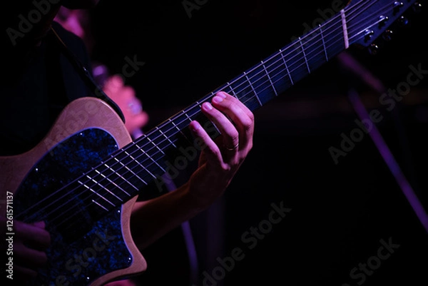 Fototapeta Guitarist's Hands in Performance