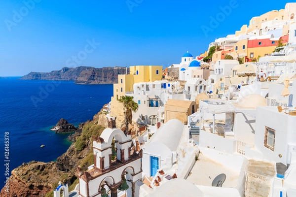 Fototapeta View of famous Oia village with colorful houses, Santorini island, Greece