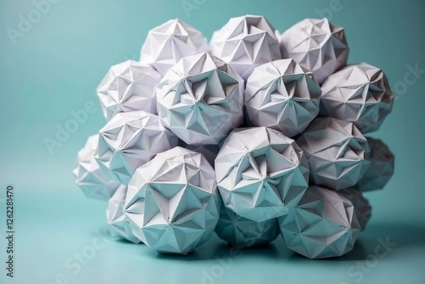 Fototapeta Crumpled paper balls forming a creative sculpture, symbolizing teamwork and innovation.