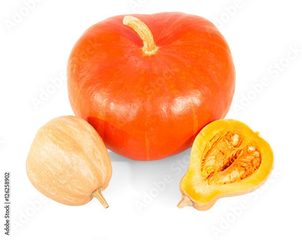 Fototapeta Two whole and half of pumpkin close up isolated .
