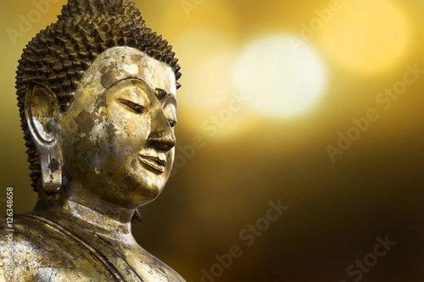 Fototapeta Selective focus point on Buddha statue.