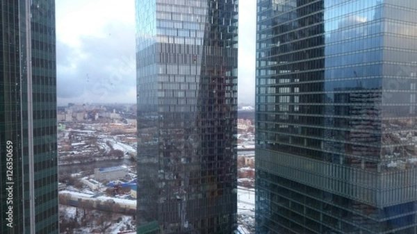 Fototapeta Вид на город чрез небоскребы