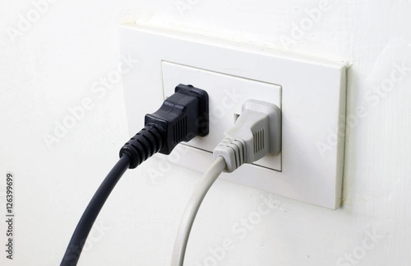 Obraz Electric plugs on power socket