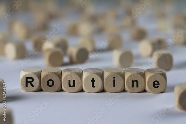 Obraz Routine - Holzwürfel mit Buchstaben
