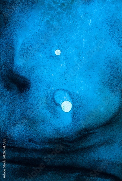 Fototapeta Ethereal image presents an abstract composition with a dreamlike quality,  two luminous circular forms reminiscent of distant moons