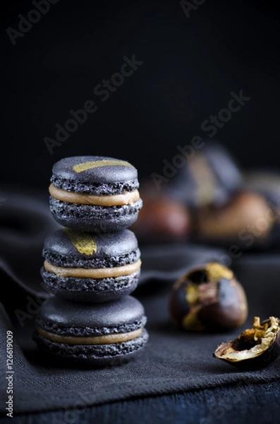 Fototapeta Black macaron with chesnut