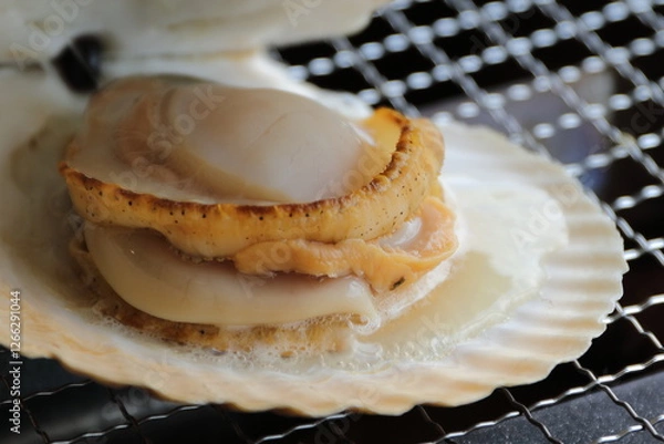 Obraz 網の上で焼いたホタテ