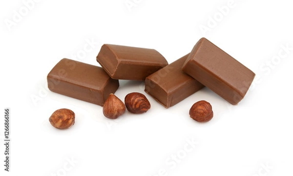 Fototapeta Pure hazelnut nougat bar isolated. Chocolate sweet with nougat isolated on white background.