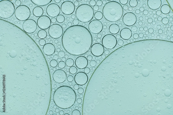 Fototapeta Macro microscope green bubble texture, Close-up Green bubbles and drops oil background . blue green water bubbles, close up golden oil drop for cosmetic...
