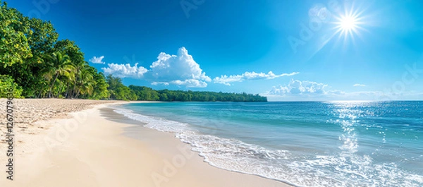 Fototapeta panoramic view of beautiful beach with white sand, clear blue water, and lush green trees under bright sun, creating serene and inviting atmosphere