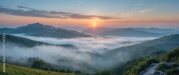 Obraz Mountainous landscape at sunrise with fog covering valleys and peaks in soft morning light Copy Space