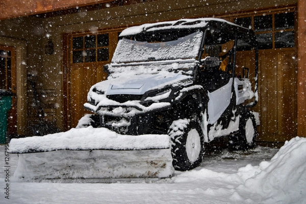 Fototapeta Fresh snow on a snow plow during a blizzard on a snowy day in the winter in Durango, Colorado, United States
