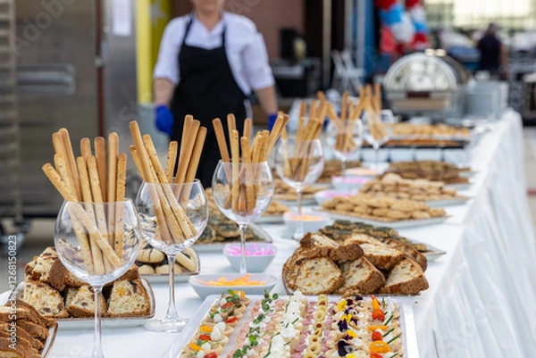 Obraz catering wedding buffet with variety of food snacks and appetizers