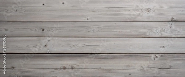 Obraz a wooden surface, showcasing a vertical layout of four wide planks. The wood has a weathered and rustic appearance, with a predominantly light gray color, interspersed with subtle variations in tone. 