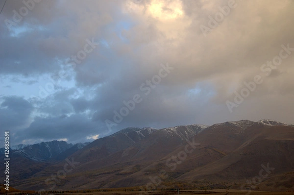 Fototapeta Снежные вершины в облаках