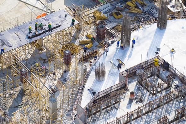 Obraz Construction site workers - aerial - Top View