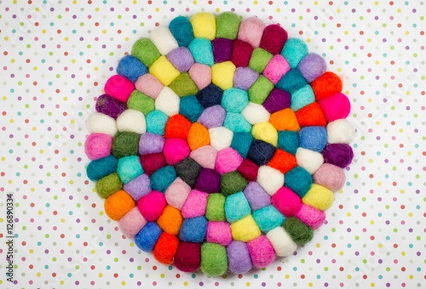 Obraz Colorful balls of wool.Felt handmade. Potholder with colorful beads.Colorful dots paper background.