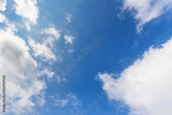 Obraz Blue sky background with white clouds