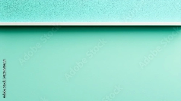 Fototapeta A minimalist image featuring a textured turquoise surface with a subtle white border, conveying tranquility and simplicity.