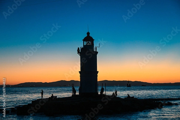 Obraz lighthouse at sunset