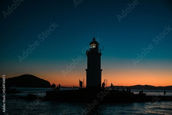 Obraz lighthouse at sunset