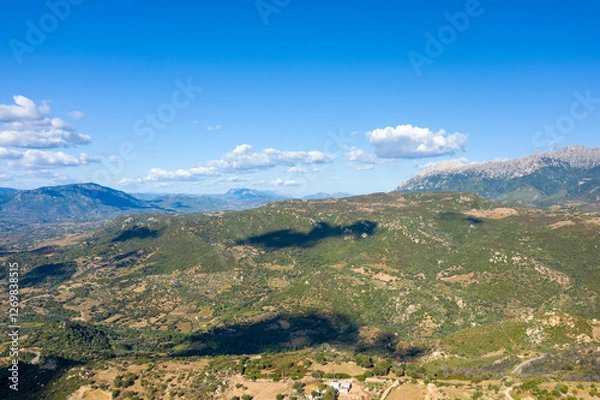 Fototapeta The countryside around Orgosolo in Europe, Italy, Sardinia, Orgosolo, in summer, on a sunny day.