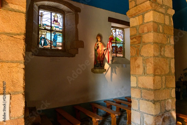 Fototapeta The interior of the chapel of Saint-Cado in Etel in Europe, France, Brittany, Morbihan, Etel, in summer, on a sunny day.