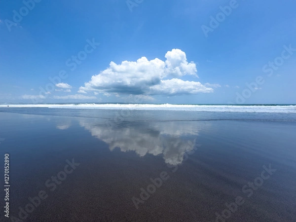 Fototapeta Cloud reflection on beach in Bali Asia - concept of photography, travel, nature, mirror, mirroring