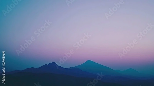 Fototapeta Serene twilight landscape showcasing layered mountains under a gradient sky at dusk
