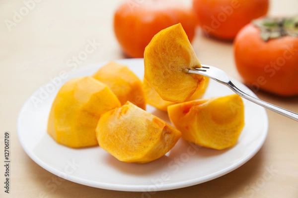 Obraz 切った柿とフォーク