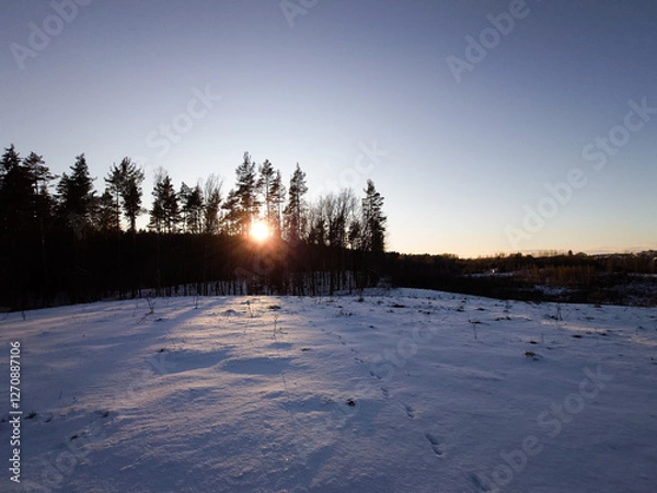 Obraz Zimowy zachód słońca