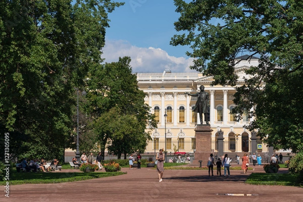 Fototapeta St Petersburg, Russia - August 15, 2024: Monument to the famous Russian poet of the 19th century Alexander Sergeevich Pushkin on Arts Square in front of the State Russian Museum (Mikhailovsky Palace)