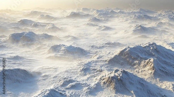 Obraz Aerial view of a vast snow-covered mountain range under bright sunlight