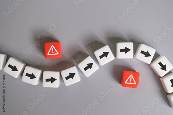 Fototapeta arrow avoid risk warning sign on red cube with copy space. Risk management concept with preventive plan for any accident or unplan incident to protect business or system from failure or crisis.