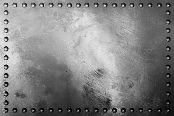 Obraz Dark metal plate texture with rivet.