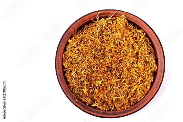 Fototapeta Fermented yellow tobacco in a brown plate on a white background