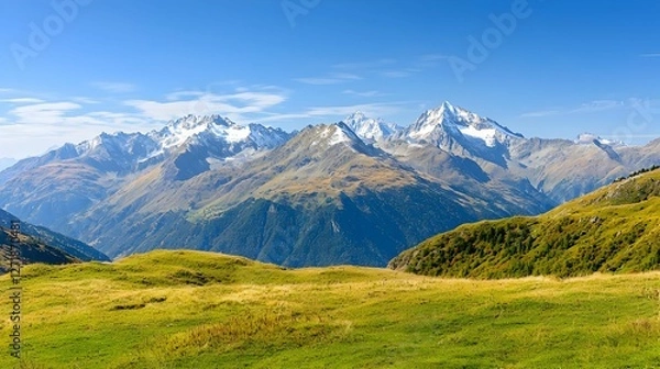 Fototapeta Majestic Snowcapped Mountain Range Under a Clear Blue Sky